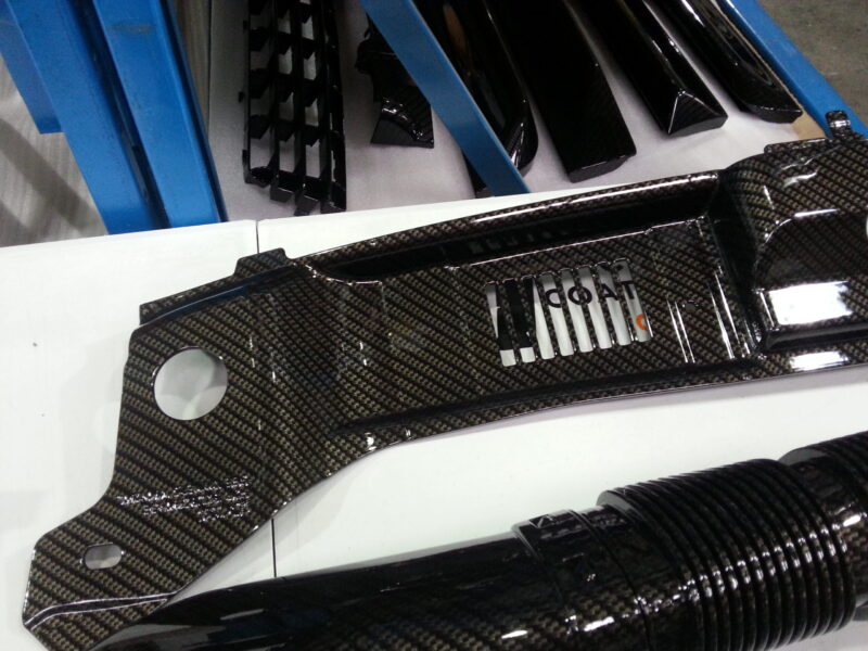 Car Engine Elements Coated In Carbon Fibre Hydrographic Film Painted Black