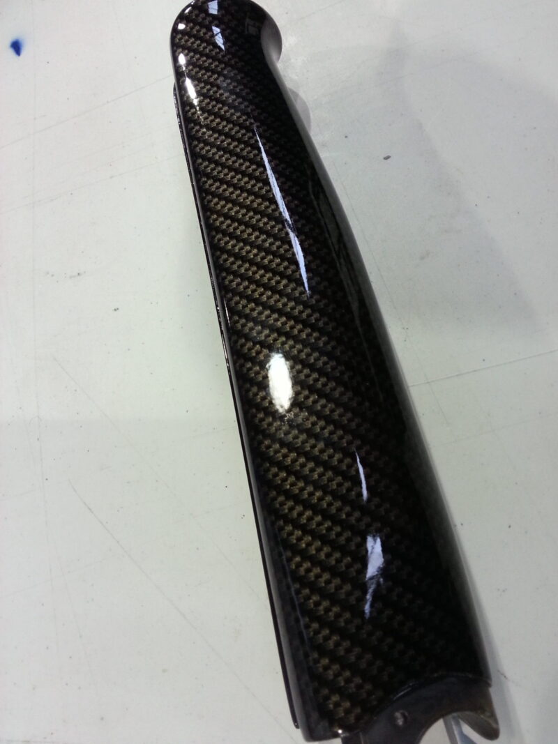 Gun elements coated in carbon fibre hydrographic film painted black