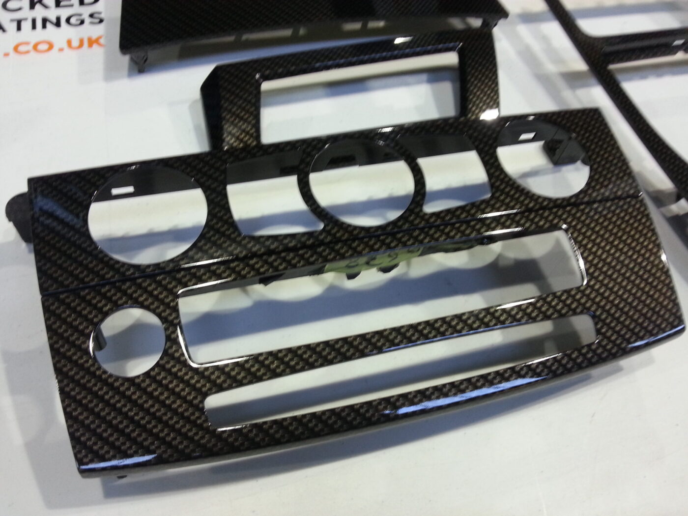 BMW interior various elements coated in carbon fibre hydrographic film painted black