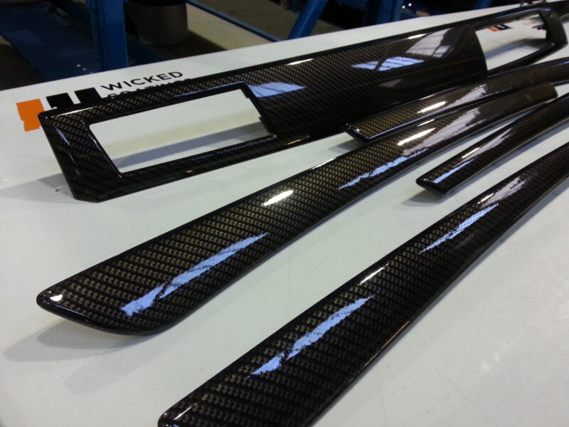 BMW interior various elements coated in carbon fibre hydrographic film painted black