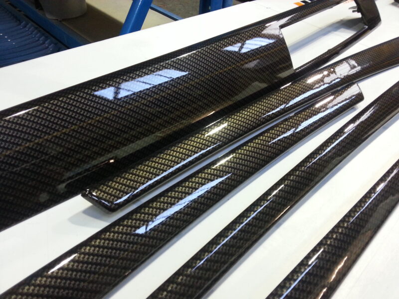 BMW interior various elements coated in carbon fibre hydrographic film painted black