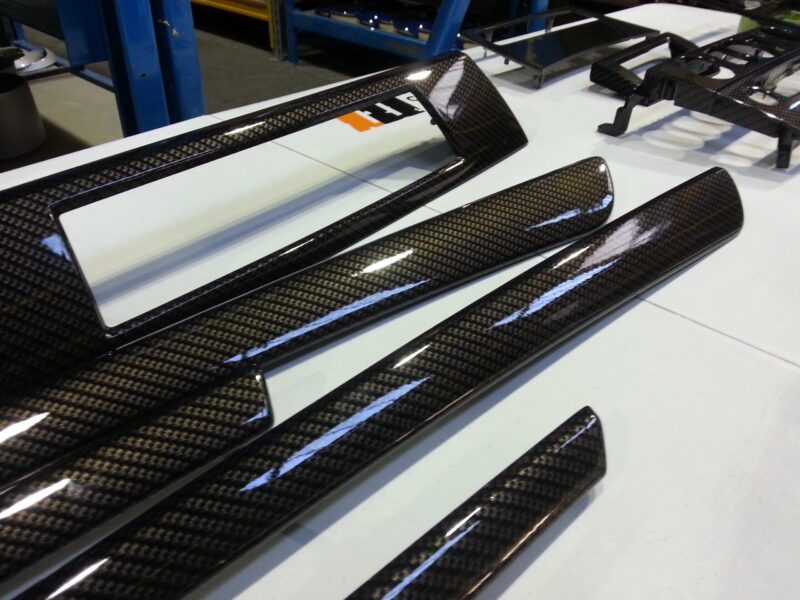 BMW interior various elements coated in carbon fibre hydrographic film painted black