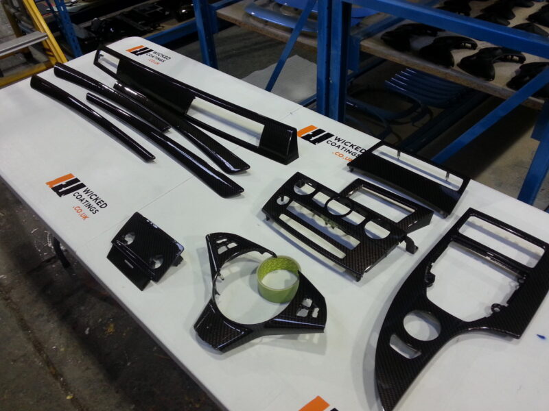 BMW interior various elements coated in carbon fibre hydrographic film painted black