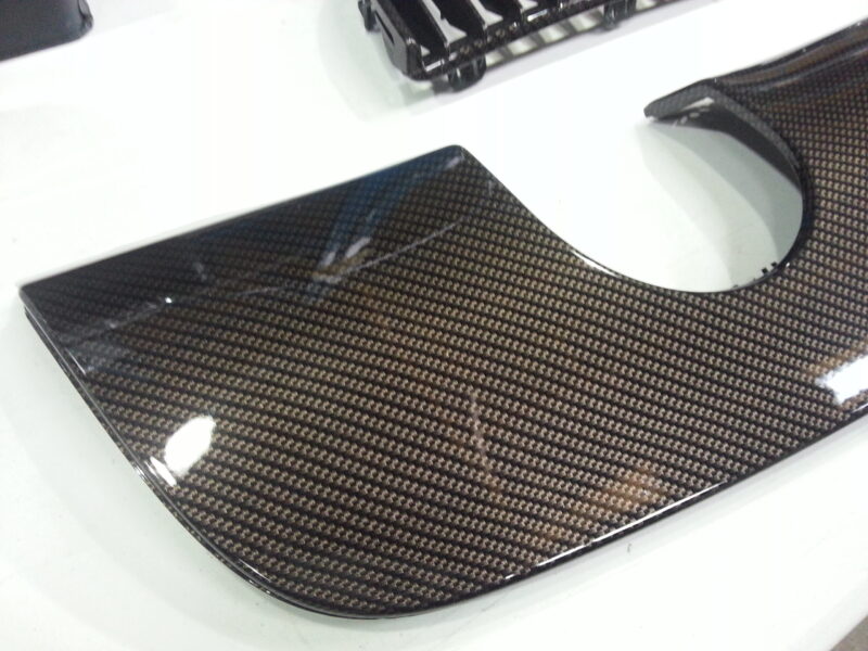 BMW exterior elements coated in carbon fibre hydrographic film painted black