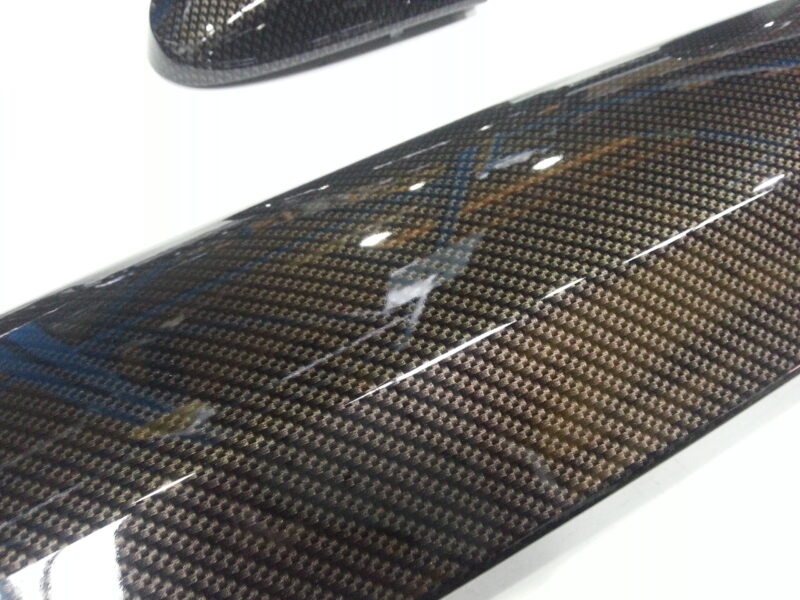 BMW exterior elements coated in carbon fibre hydrographic film painted black