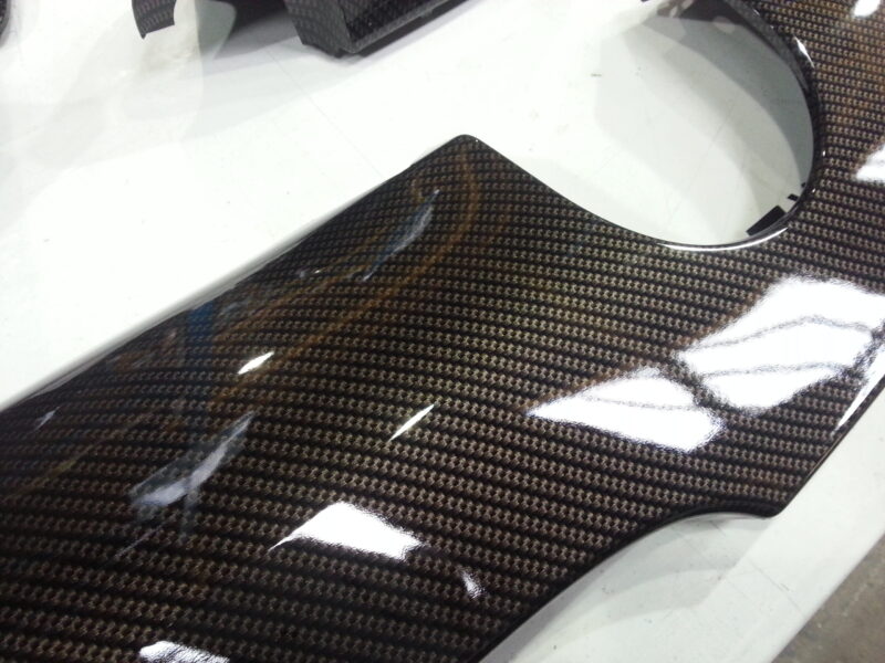 BMW exterior elements coated in carbon fibre hydrographic film painted black