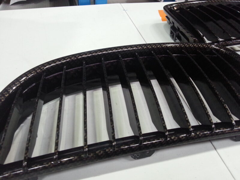 BMW exterior elements coated in carbon fibre hydrographic film painted black