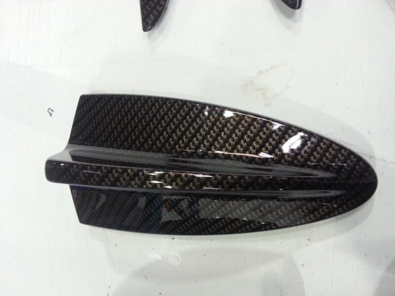 BMW exterior elements coated in carbon fibre hydrographic film painted black