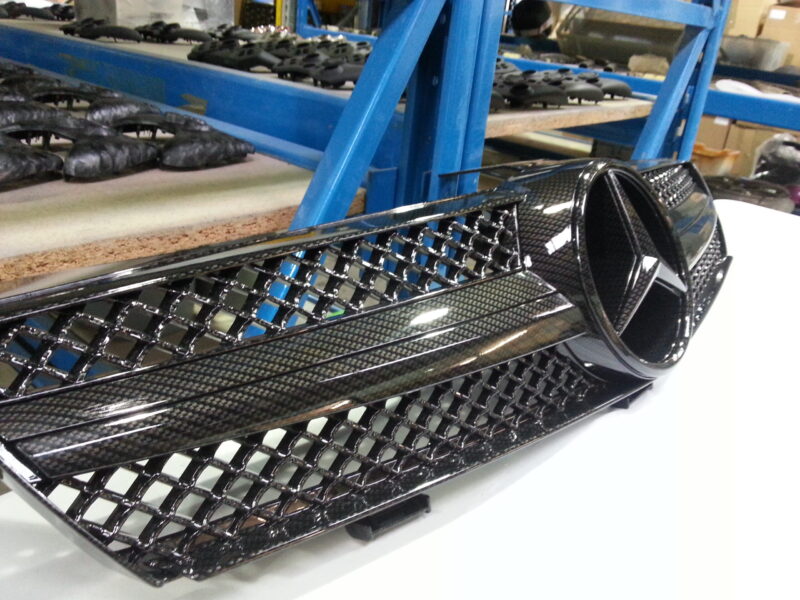 Mercedes radiator grill coated in carbon fibre hydrographic film painted black