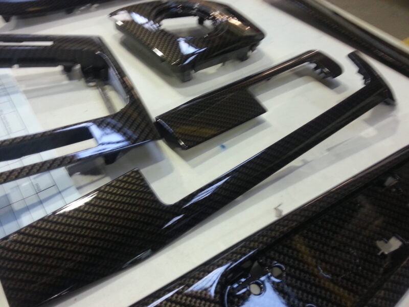 BMW interior various parts coated in carbon fibre hydrographic film painted black