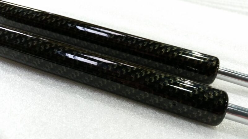 Car exterior element coated in carbon fibre