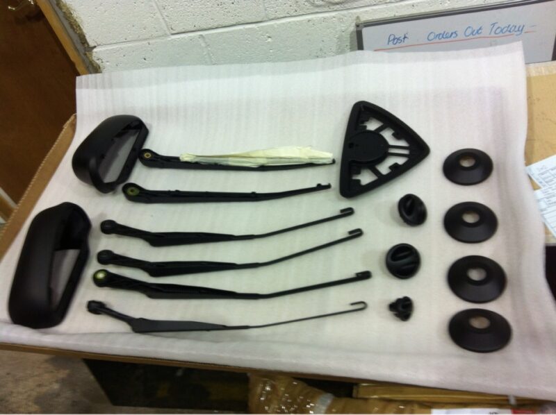 Car exterior element coated in carbon fibre