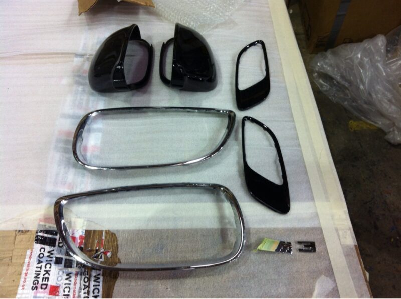 VW and BMW exterior elements coated in carbon fibre