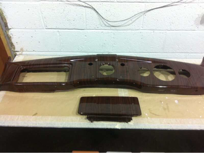 Dashboard elements coated in wood