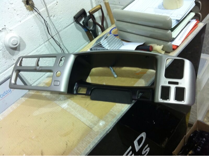Dashboard coated in carbon fibre painted silver