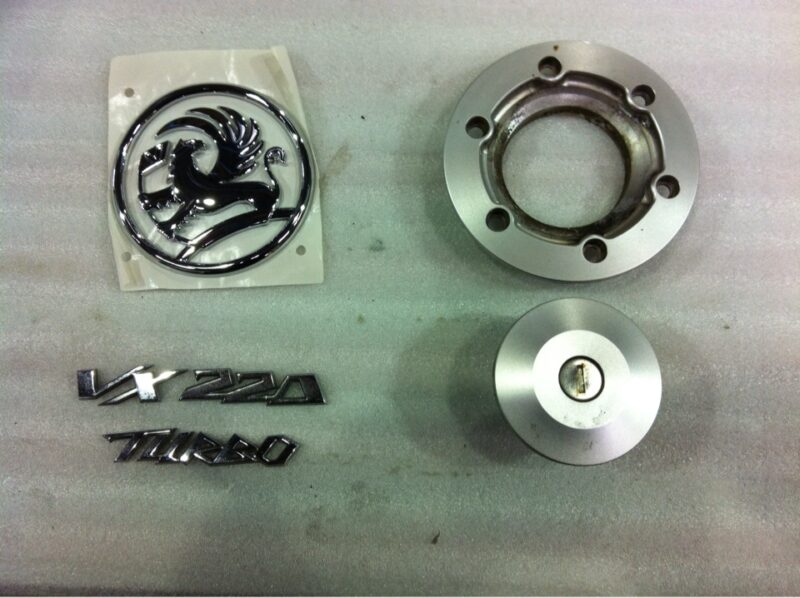 Vauxhall VX 220 Turbo badge coated in carbon fibre