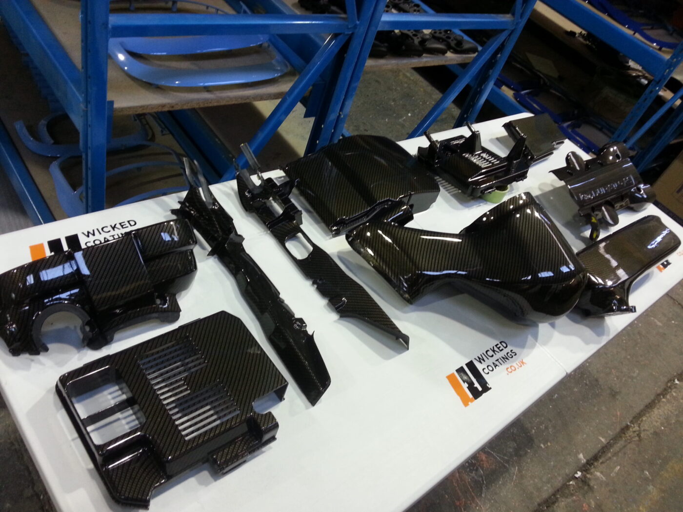 Ford Focus RS engine parts coated in carbon fibre hydrographic film painted black