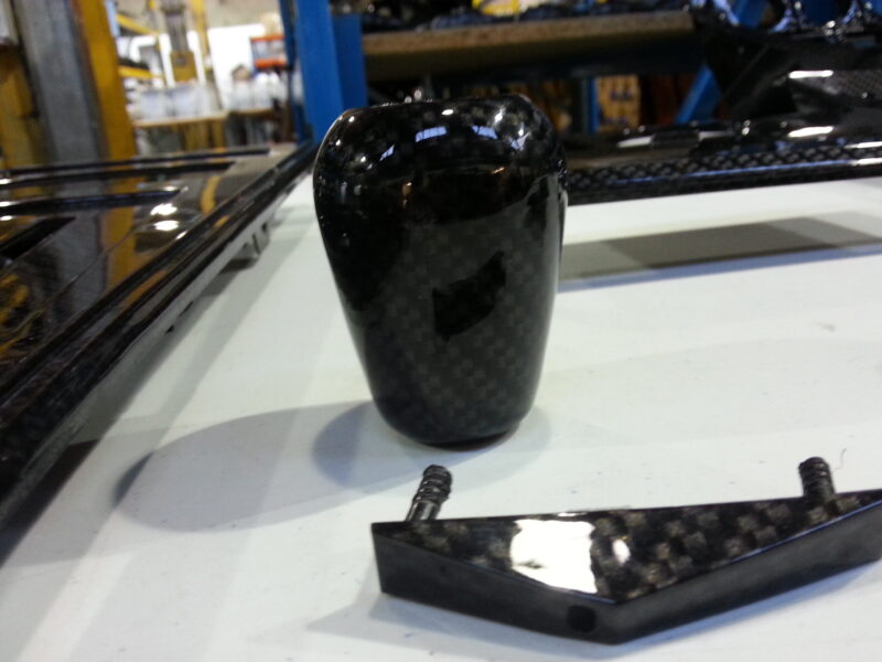 Car interior various elements coated in carbon fibre hydrographic film painted black