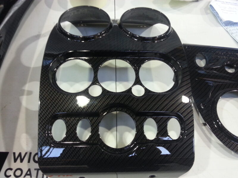 Car various elements coated in carbon fibre hydrographic film painted black