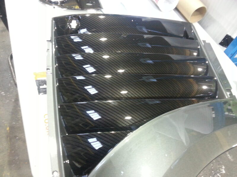 Car various elements coated in carbon fibre hydrographic film painted black
