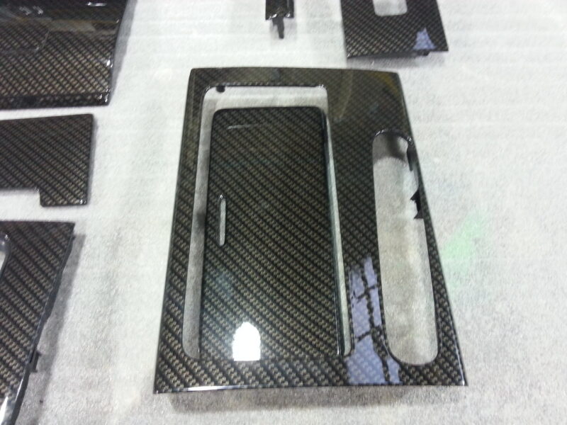 Car interior various elements coated in carbon fibre hydrographic film painted black