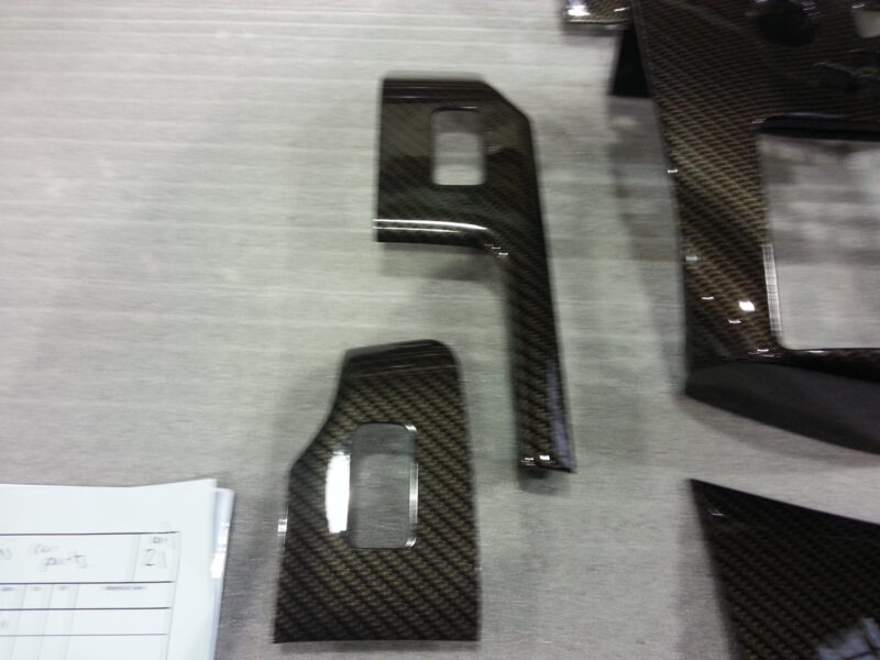 Car interior various elements coated in carbon fibre hydrographic film painted black