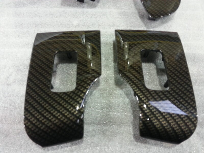 Car interior various elements coated in carbon fibre hydrographic film painted black