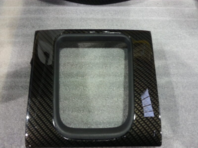 Car interior various elements coated in carbon fibre hydrographic film painted black