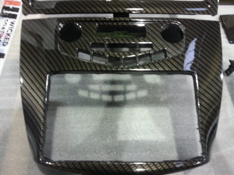 Car interior various elements coated in carbon fibre hydrographic film painted black