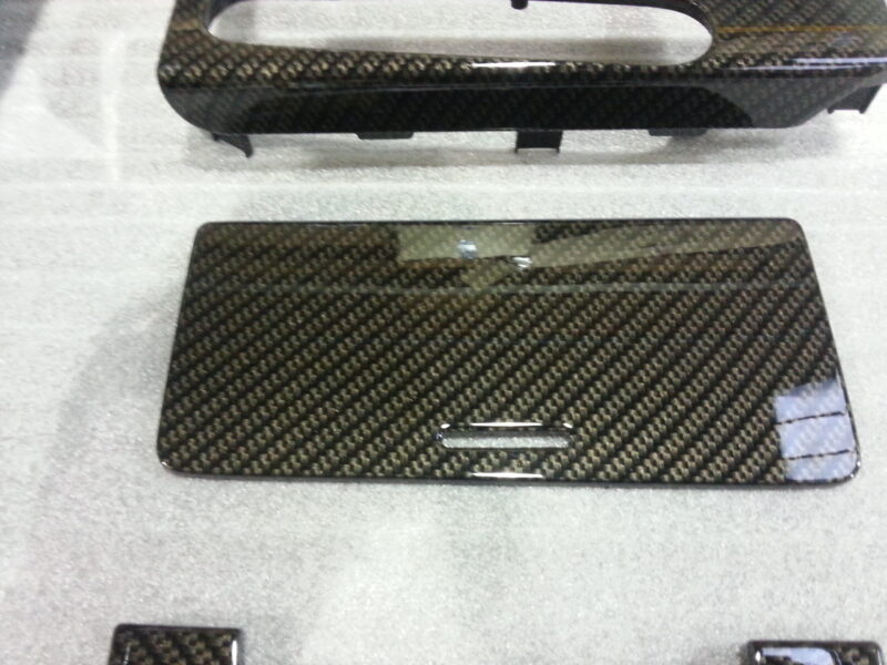 Car interior various elements coated in carbon fibre hydrographic film painted black