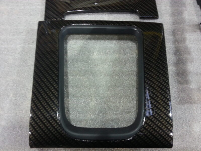 Car interior various elements coated in carbon fibre hydrographic film painted black