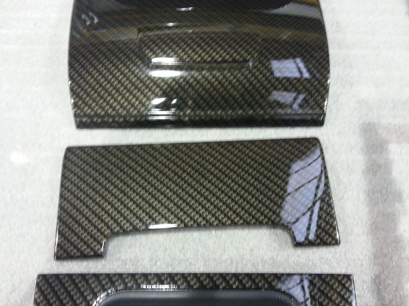 Car interior various elements coated in carbon fibre hydrographic film painted black