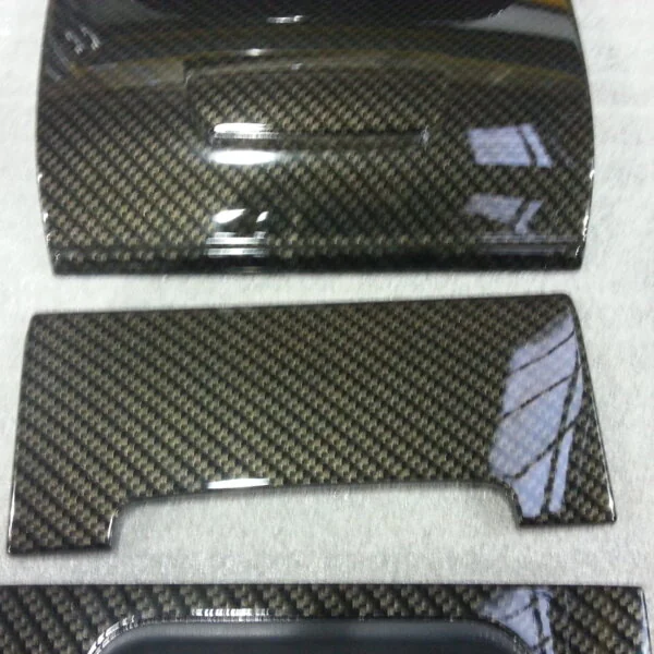 Car interior various elements coated in carbon fibre hydrographic film painted black