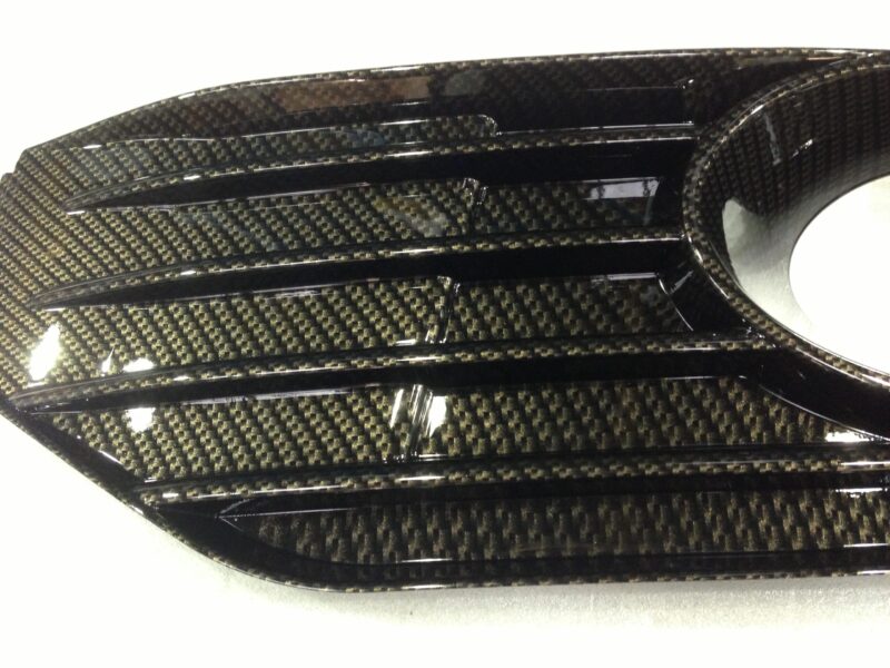 VW exterior elements coated in carbon fibre hydrographic film painted black