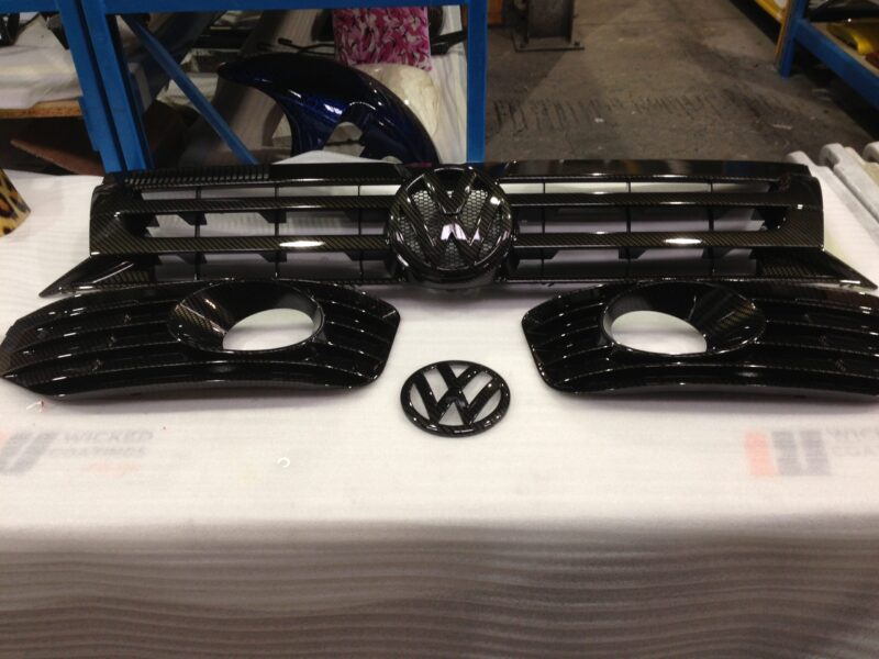 VW exterior elements coated in carbon fibre hydrographic film painted black