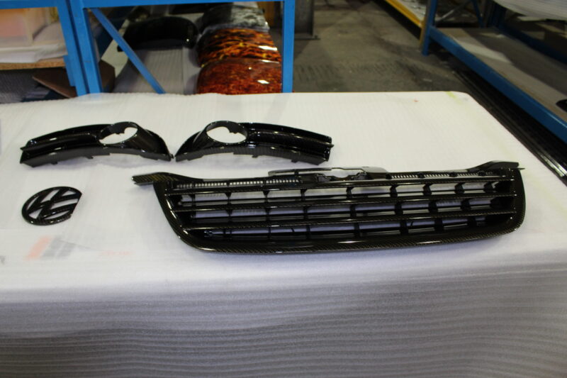 VW exterior elements coated in carbon fibre hydrographic film painted black