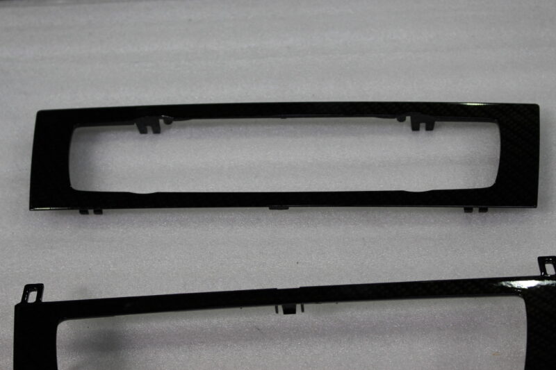 Car interior various elements coated in carbon fibre hydrographic film painted black