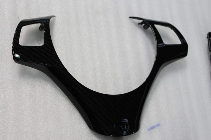 Car interior various elements coated in carbon fibre hydrographic film painted black
