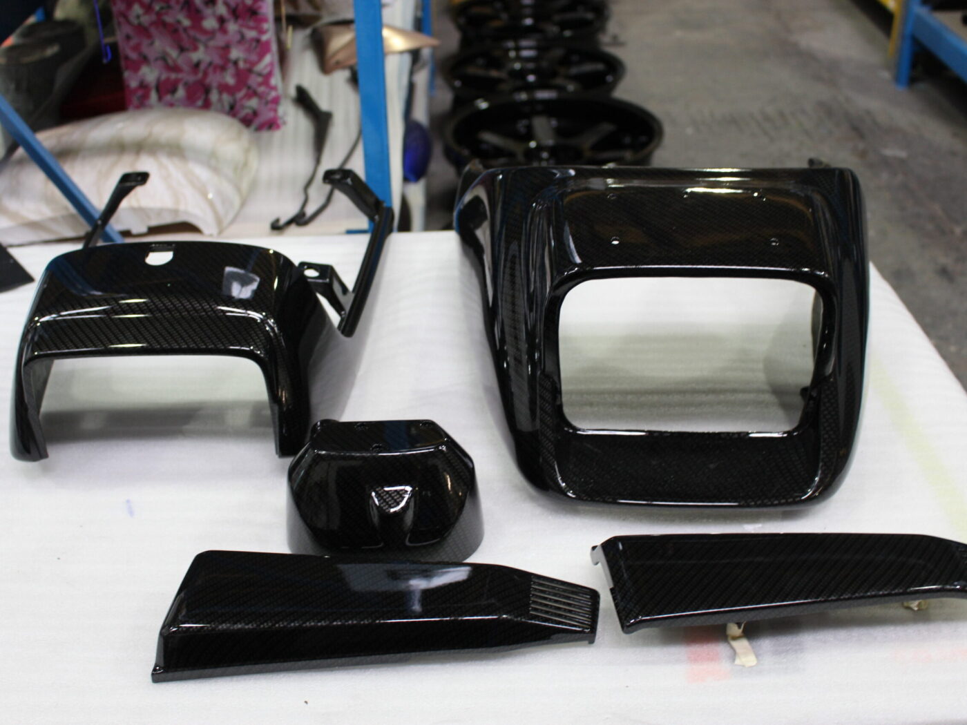 Classic Motorbike parts coated in carbon fibre hydrographic film painted black