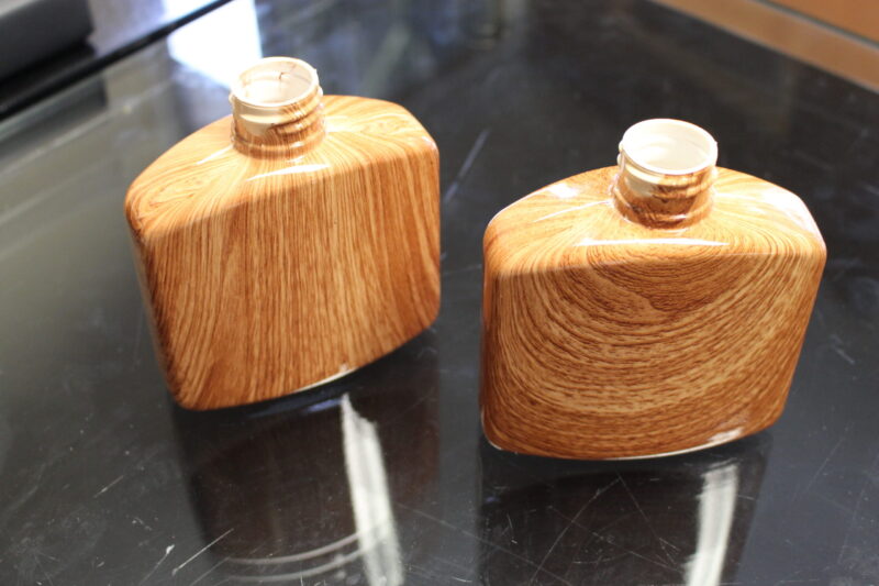 Hip flask coated in wood hydrographic film