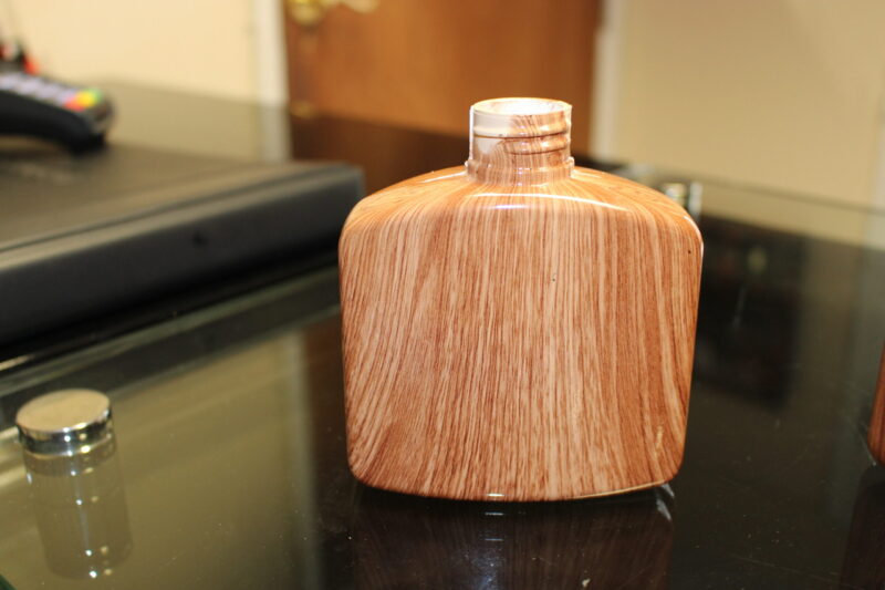 Hip flask coated in wood hydrographic film