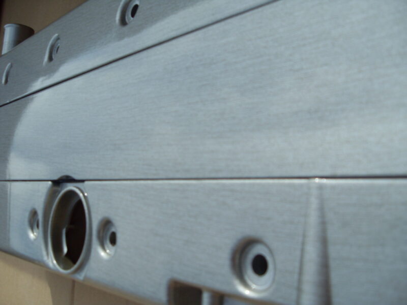 Vuaxhall VX220 engine cover coated in metal hydrographic film