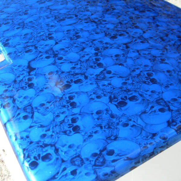 Car engine parts coated in skull hydrographic film painted blue