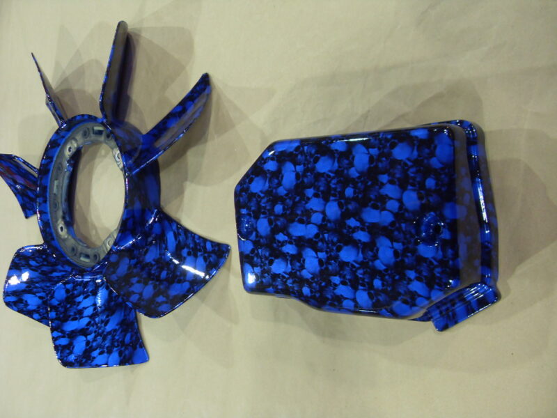 Car engine parts coated in skull hydrographic film painted blue