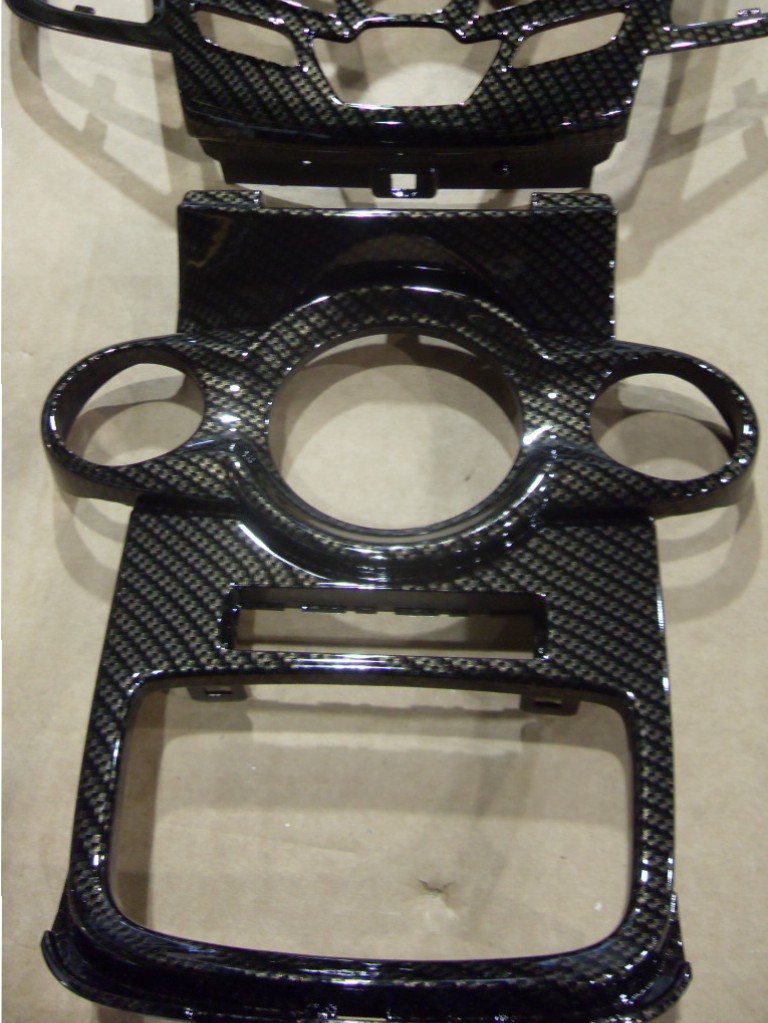 Car interior various elements coated in carbon fibre hydrographic film
