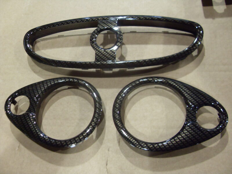 Car interior various elements coated in carbon fibre hydrographic film