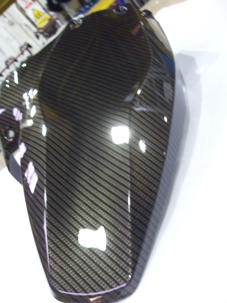 Motorbike various elements coated in carbon fibre hydrographic film painted black