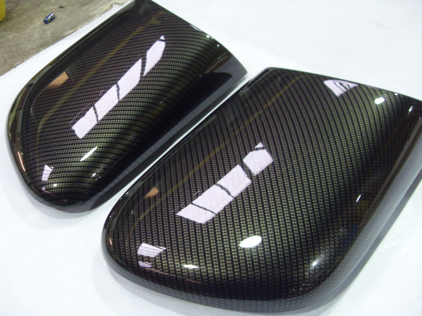 Motorbike various elements coated in carbon fibre hydrographic film painted black