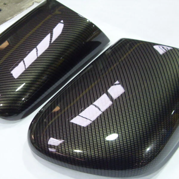 Motorbike various elements coated in carbon fibre hydrographic film painted black
