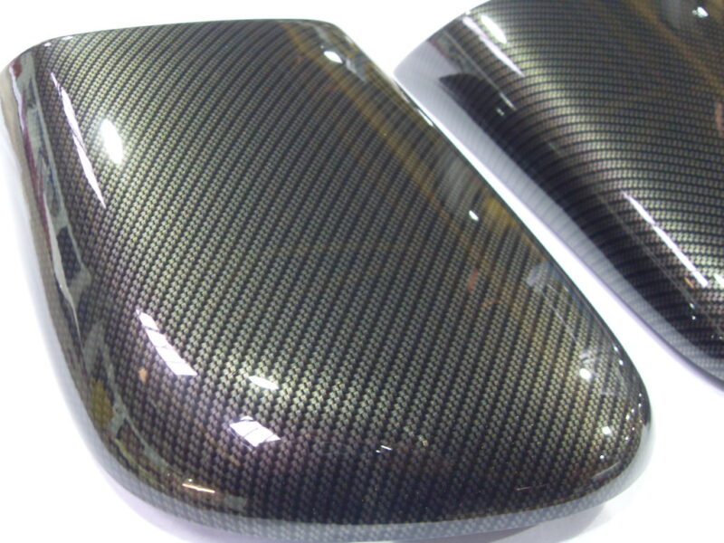 Motorbike various elements coated in carbon fibre hydrographic film painted black